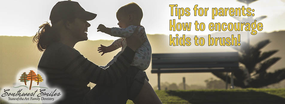 mom and baby encouraging kids to brush