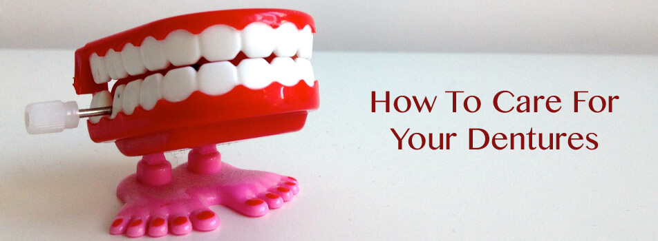 wind-up toy teeth on white table