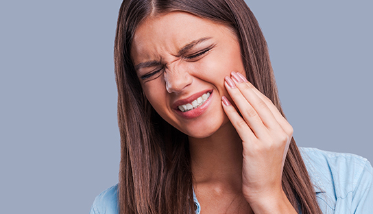 woman in tooth pain