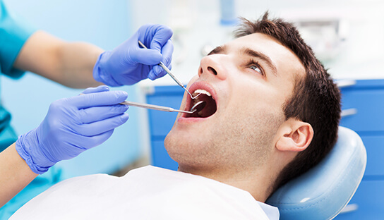 man in dental chair