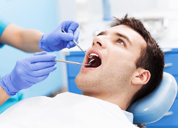 man at dentist