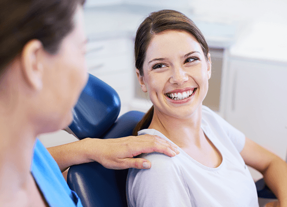 woman at the dentist smiling