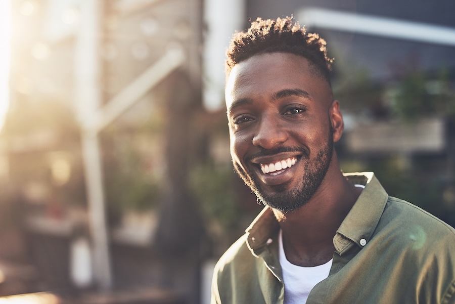 man smiling after professional teeth whitening