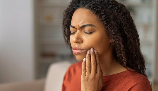 woman in tooth pain